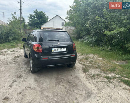 Черный Сузуки СХ4, объемом двигателя 1.59 л и пробегом 233 тыс. км за 5900 $, фото 8 на Automoto.ua