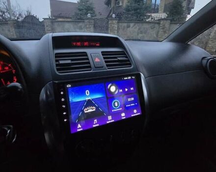 Черный Сузуки СХ4, объемом двигателя 1.6 л и пробегом 178 тыс. км за 5700 $, фото 29 на Automoto.ua