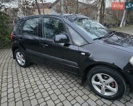 Черный Сузуки СХ4, объемом двигателя 1.6 л и пробегом 178 тыс. км за 5700 $, фото 3 на Automoto.ua