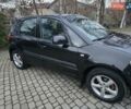 Черный Сузуки СХ4, объемом двигателя 1.6 л и пробегом 178 тыс. км за 5700 $, фото 3 на Automoto.ua