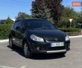 Черный Сузуки СХ4, объемом двигателя 1.6 л и пробегом 204 тыс. км за 6550 $, фото 1 на Automoto.ua