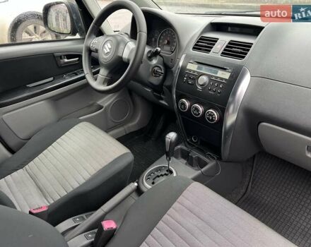 Черный Сузуки СХ4, объемом двигателя 1.59 л и пробегом 155 тыс. км за 7500 $, фото 7 на Automoto.ua