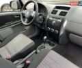 Черный Сузуки СХ4, объемом двигателя 1.59 л и пробегом 155 тыс. км за 7500 $, фото 7 на Automoto.ua