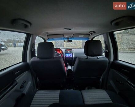 Черный Сузуки СХ4, объемом двигателя 1.6 л и пробегом 178 тыс. км за 5700 $, фото 15 на Automoto.ua