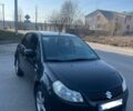 Черный Сузуки СХ4, объемом двигателя 1.6 л и пробегом 220 тыс. км за 6300 $, фото 1 на Automoto.ua