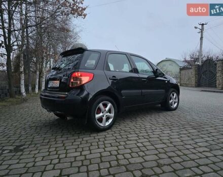 Черный Сузуки СХ4, объемом двигателя 1.6 л и пробегом 178 тыс. км за 5700 $, фото 14 на Automoto.ua