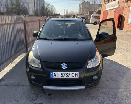 Черный Сузуки СХ4, объемом двигателя 1.6 л и пробегом 131 тыс. км за 7500 $, фото 1 на Automoto.ua