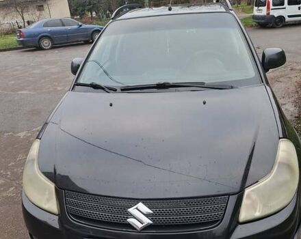 Чорний Сузукі СХ4, об'ємом двигуна 1.59 л та пробігом 265 тис. км за 6500 $, фото 1 на Automoto.ua