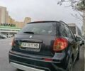 Черный Сузуки СХ4, объемом двигателя 1.6 л и пробегом 185 тыс. км за 6500 $, фото 1 на Automoto.ua