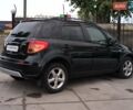 Чорний Сузукі СХ4, об'ємом двигуна 1.59 л та пробігом 137 тис. км за 7490 $, фото 4 на Automoto.ua