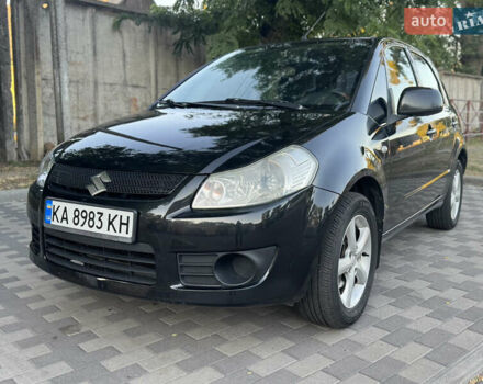 Черный Сузуки СХ4, объемом двигателя 1.59 л и пробегом 204 тыс. км за 5800 $, фото 3 на Automoto.ua