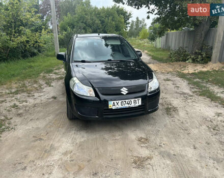 Черный Сузуки СХ4, объемом двигателя 1.59 л и пробегом 233 тыс. км за 5900 $, фото 4 на Automoto.ua