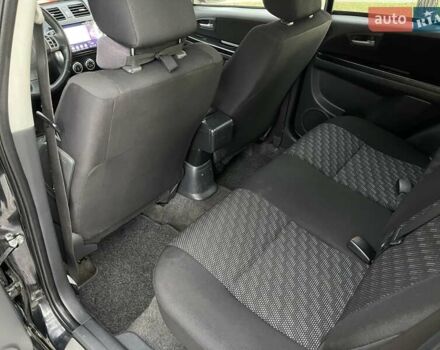 Черный Сузуки СХ4, объемом двигателя 2 л и пробегом 164 тыс. км за 7999 $, фото 17 на Automoto.ua