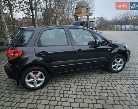 Черный Сузуки СХ4, объемом двигателя 1.6 л и пробегом 178 тыс. км за 5700 $, фото 4 на Automoto.ua