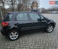 Черный Сузуки СХ4, объемом двигателя 1.6 л и пробегом 178 тыс. км за 5700 $, фото 4 на Automoto.ua