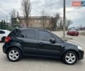 Черный Сузуки СХ4, объемом двигателя 1.59 л и пробегом 155 тыс. км за 7500 $, фото 2 на Automoto.ua