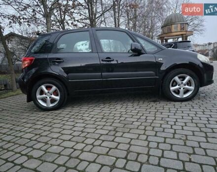 Черный Сузуки СХ4, объемом двигателя 1.6 л и пробегом 178 тыс. км за 5700 $, фото 13 на Automoto.ua
