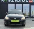 Черный Сузуки СХ4, объемом двигателя 1.6 л и пробегом 93 тыс. км за 5890 $, фото 1 на Automoto.ua