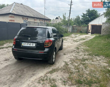 Черный Сузуки СХ4, объемом двигателя 1.59 л и пробегом 233 тыс. км за 5900 $, фото 7 на Automoto.ua