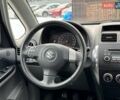 Чорний Сузукі СХ4, об'ємом двигуна 1.59 л та пробігом 137 тис. км за 7290 $, фото 13 на Automoto.ua