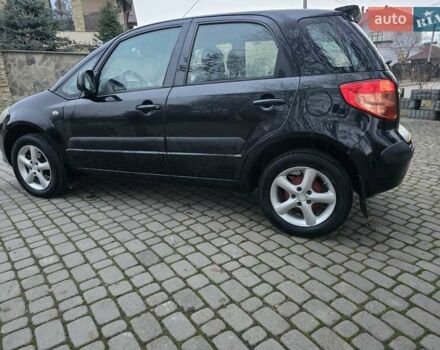Черный Сузуки СХ4, объемом двигателя 1.6 л и пробегом 178 тыс. км за 5700 $, фото 26 на Automoto.ua