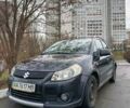 Черный Сузуки СХ4, объемом двигателя 1.6 л и пробегом 185 тыс. км за 6500 $, фото 1 на Automoto.ua