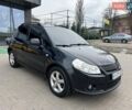 Черный Сузуки СХ4, объемом двигателя 1.59 л и пробегом 155 тыс. км за 7500 $, фото 1 на Automoto.ua