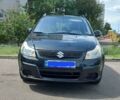 Черный Сузуки СХ4, объемом двигателя 2 л и пробегом 160 тыс. км за 8500 $, фото 1 на Automoto.ua