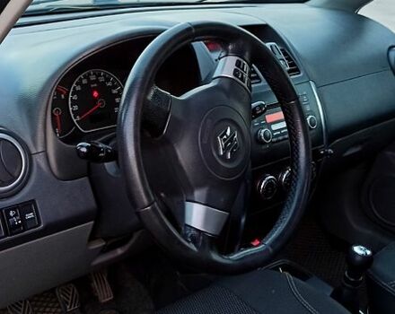 Чорний Сузукі СХ4, об'ємом двигуна 1.6 л та пробігом 208 тис. км за 7500 $, фото 5 на Automoto.ua