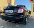 Чорний Сузукі СХ4, об'ємом двигуна 1.59 л та пробігом 240 тис. км за 5100 $, фото 12 на Automoto.ua