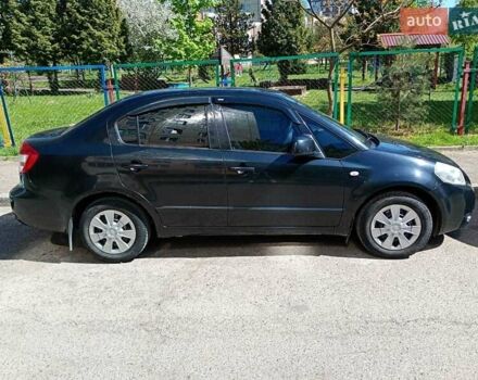 Черный Сузуки СХ4, объемом двигателя 1.6 л и пробегом 185 тыс. км за 6200 $, фото 2 на Automoto.ua