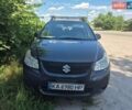 Черный Сузуки СХ4, объемом двигателя 1.6 л и пробегом 309 тыс. км за 5200 $, фото 1 на Automoto.ua