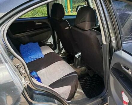 Черный Сузуки СХ4, объемом двигателя 1.6 л и пробегом 185 тыс. км за 6200 $, фото 3 на Automoto.ua