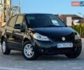 Чорний Сузукі СХ4, об'ємом двигуна 1.59 л та пробігом 240 тис. км за 5250 $, фото 1 на Automoto.ua