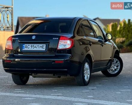 Чорний Сузукі СХ4, об'ємом двигуна 1.59 л та пробігом 240 тис. км за 5100 $, фото 11 на Automoto.ua