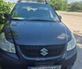 Черный Сузуки СХ4, объемом двигателя 1.6 л и пробегом 309 тыс. км за 5500 $, фото 1 на Automoto.ua
