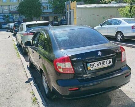 Черный Сузуки СХ4, объемом двигателя 1.6 л и пробегом 185 тыс. км за 6200 $, фото 4 на Automoto.ua