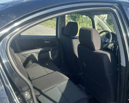 Черный Сузуки СХ4, объемом двигателя 1.6 л и пробегом 166 тыс. км за 6200 $, фото 7 на Automoto.ua