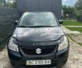Черный Сузуки СХ4, объемом двигателя 1.6 л и пробегом 270 тыс. км за 5000 $, фото 1 на Automoto.ua