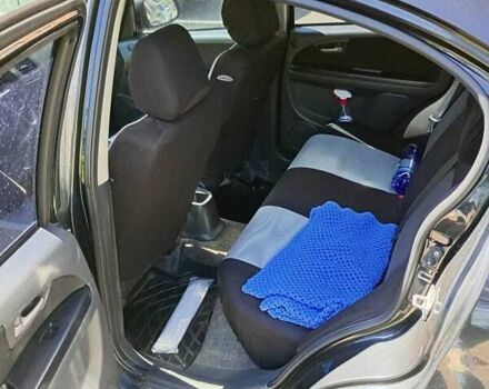 Черный Сузуки СХ4, объемом двигателя 1.6 л и пробегом 185 тыс. км за 6200 $, фото 1 на Automoto.ua