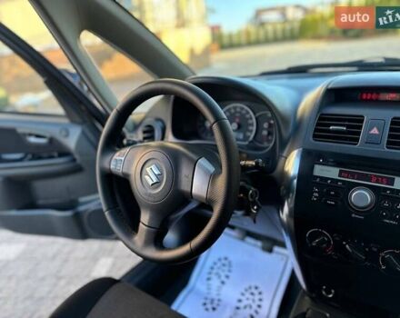 Чорний Сузукі СХ4, об'ємом двигуна 1.59 л та пробігом 240 тис. км за 5100 $, фото 19 на Automoto.ua