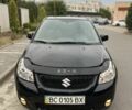 Черный Сузуки СХ4, объемом двигателя 1.6 л и пробегом 260 тыс. км за 4305 $, фото 2 на Automoto.ua