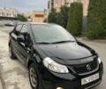 Черный Сузуки СХ4, объемом двигателя 1.6 л и пробегом 260 тыс. км за 4305 $, фото 1 на Automoto.ua