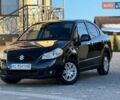 Чорний Сузукі СХ4, об'ємом двигуна 1.59 л та пробігом 240 тис. км за 5100 $, фото 6 на Automoto.ua