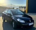 Черный Сузуки СХ4, объемом двигателя 1.6 л и пробегом 340 тыс. км за 4200 $, фото 1 на Automoto.ua