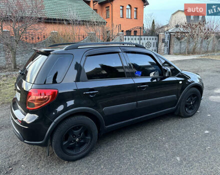 Черный Сузуки СХ4, объемом двигателя 1.59 л и пробегом 147 тыс. км за 8999 $, фото 7 на Automoto.ua