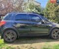 Черный Сузуки СХ4, объемом двигателя 1.6 л и пробегом 344 тыс. км за 5200 $, фото 1 на Automoto.ua