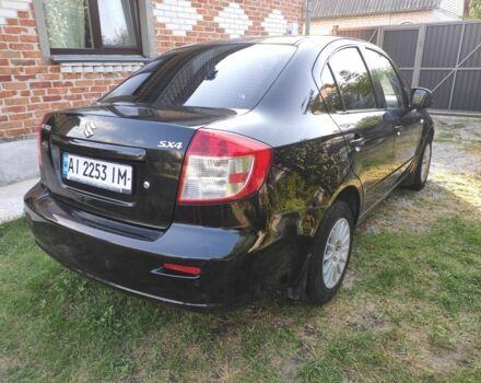 Черный Сузуки СХ4, объемом двигателя 1.6 л и пробегом 211 тыс. км за 5200 $, фото 2 на Automoto.ua