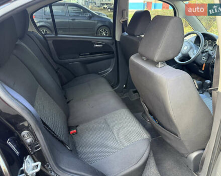 Чорний Сузукі СХ4, об'ємом двигуна 2 л та пробігом 148 тис. км за 7000 $, фото 31 на Automoto.ua