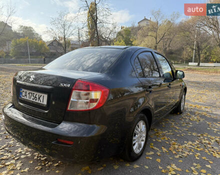 Черный Сузуки СХ4, объемом двигателя 2 л и пробегом 240 тыс. км за 8500 $, фото 2 на Automoto.ua